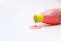 Scrub with green beads in transparent bottle on a white table home Royalty Free Stock Photo