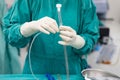 Scrub nurse praparing instruments for open heart operation