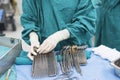 Scrub nurse prepare medical instruments