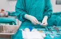 Scrub nurse prepare medical instruments for surgery Royalty Free Stock Photo