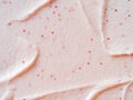 Scrub smears. Pink exfoliating body polish texture