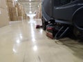 Scrubber drier for cleaning storage facilities.  Close-up.Floor polisher.Floor cleaning machine. Floor maintenance. Royalty Free Stock Photo