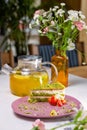 Scrumptious Green Cake with Strawberries on a Pink Plate