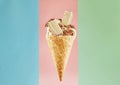 Scrumptious Ice Cream Cone with Wafer and Chocolate Isolated on a Multicolor Background