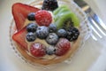 Scrumptious looking detail in fresh fruit tart Royalty Free Stock Photo