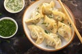 Scrumptious manti dumplings arranged enticingly on dark background