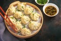 Scrumptious manti dumplings arranged enticingly on dark background