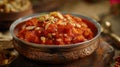 Delicious Moong Dal Halwa Dessert in Metal Bowl, Nut Garnish