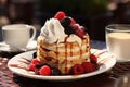 Scrumptious viennese waffles with fresh berries and sweet syrup on a table at an outdoor cafe