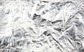 Scrunched shiny aluminium foil surface Royalty Free Stock Photo