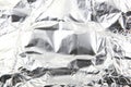 Scrunched shiny aluminium foil surface Royalty Free Stock Photo