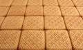 Scuare cookies background. Royalty Free Stock Photo