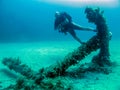 A scuba diver and anchor. Royalty Free Stock Photo