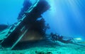 Scuba diver is exploring s sunken wreck in the aegean sea Royalty Free Stock Photo