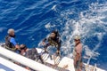 Scuba diver in his gear on a dive boat