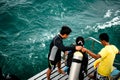 Scuba diver preparing jump to the sea for scuba diving test at Samaesarn Island