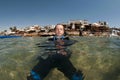 Scuba diver on surface before dive Royalty Free Stock Photo