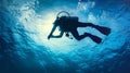 Scuba diver swimming in the blue ocean waters. Concept of underwater adventure, marine life, and scuba diving tourism