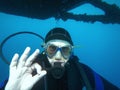 Scuba diver underwater showing OK signal Royalty Free Stock Photo