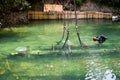 Scuba diver worker is over viewing underwater archaeology works. Royalty Free Stock Photo