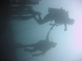 scuba divers diving sabang wrecks puerta galera Royalty Free Stock Photo