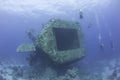 Scuba divers exploring a shipwreck Royalty Free Stock Photo