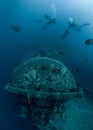 Scuba divers exploring Shipwreck SS Thistlegorm Royalty Free Stock Photo