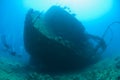 Scuba divers on a large shipwreck Royalty Free Stock Photo