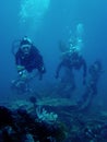 scuba divers on Saint cristopher wreck philippines Royalty Free Stock Photo