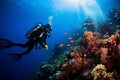 Scuba diving man exploring a breathtaking coral reef teeming with vibrant marine life, offering a captivating glimpse into the