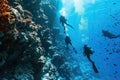 Scuba Diving Men in Blue Water, Diving in the Great Barrier Reef, Tropical Divers, Deep Underwater Royalty Free Stock Photo