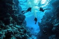 Scuba Diving Men in Blue Water, Diving in the Great Barrier Reef, Tropical Divers, Deep Underwater Royalty Free Stock Photo