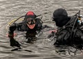 Scuba diving in a mountain lake, practicing techniques for emergency rescuers. immersion in cold water Royalty Free Stock Photo