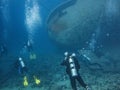 Scuba diving by wreck Cedar Pride in Aqaba, Jordan, Red Sea