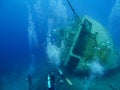 Scuba diving by wreck Cedar Pride in Aqaba, Jordan, Red Sea