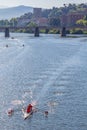 Sculling boat on the river Arno in Florence