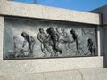 Sculpted frieze of army medics in action