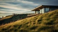 Sculpted Grass Hill With Glass House: A Prairiecore Masterpiece Royalty Free Stock Photo