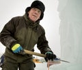 Portrait of a sculptor at work with a chisel