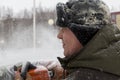 Facial portrait of the sculptor at work with a chainsaw Royalty Free Stock Photo