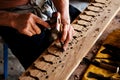 Sculptor is carving wood