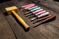 Sculptor tools at the old wooden table