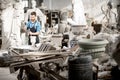 Sculptor working with sculptuers in the studio Royalty Free Stock Photo