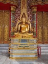 A sculptur of lord bouddha in a temple