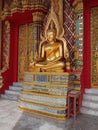 A sculptur of lord bouddha in a temple