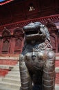 Sculpture ancient bronze napali lion singha guardian statues and carving wooden building Shiva Parvati hindu temple for people