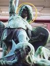 Sculpture of Archangel Michael fighting Satan at St. Michaelis Church in Hamburg Royalty Free Stock Photo