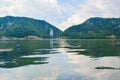 Sculpture bas-relief of the Dacian king Decebal, located on the rocky bank of the Danube in Romania. View from the coast of Serbia