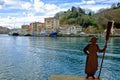 Sculpture in bay with view of the town of Donibane, Spain Royalty Free Stock Photo