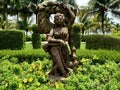 Beautiful Woman Sculpture in garden. Royalty Free Stock Photo